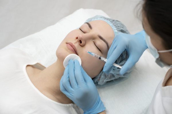 close-up-woman-lip-filler-procedure