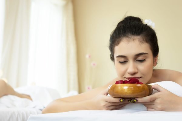 Close up of Young beautiful woman relaxing during spa treatment.