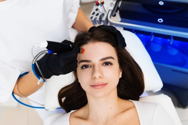 Using hydrafacial hardware cosmetology devise to improve skin condition. Rejuvenating skin with hydrafacial hardware